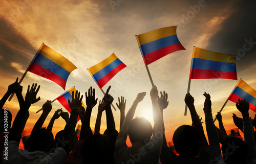 Silhouettes People Holding Flag Colombia Concept photo