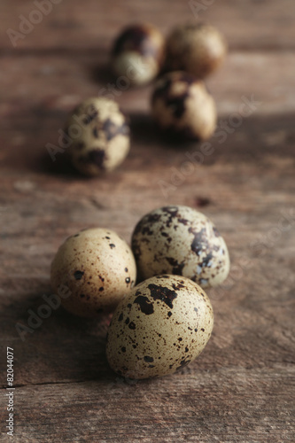 Bird eggs on wooden background