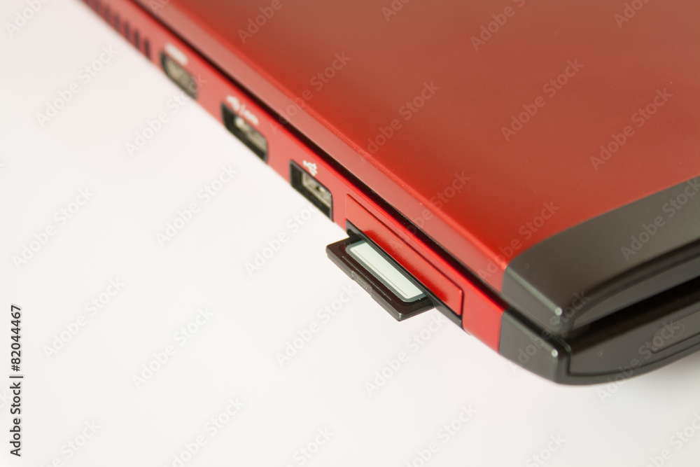 SD Card in personal computer isolated over white SD Card in personal computer isolated over white