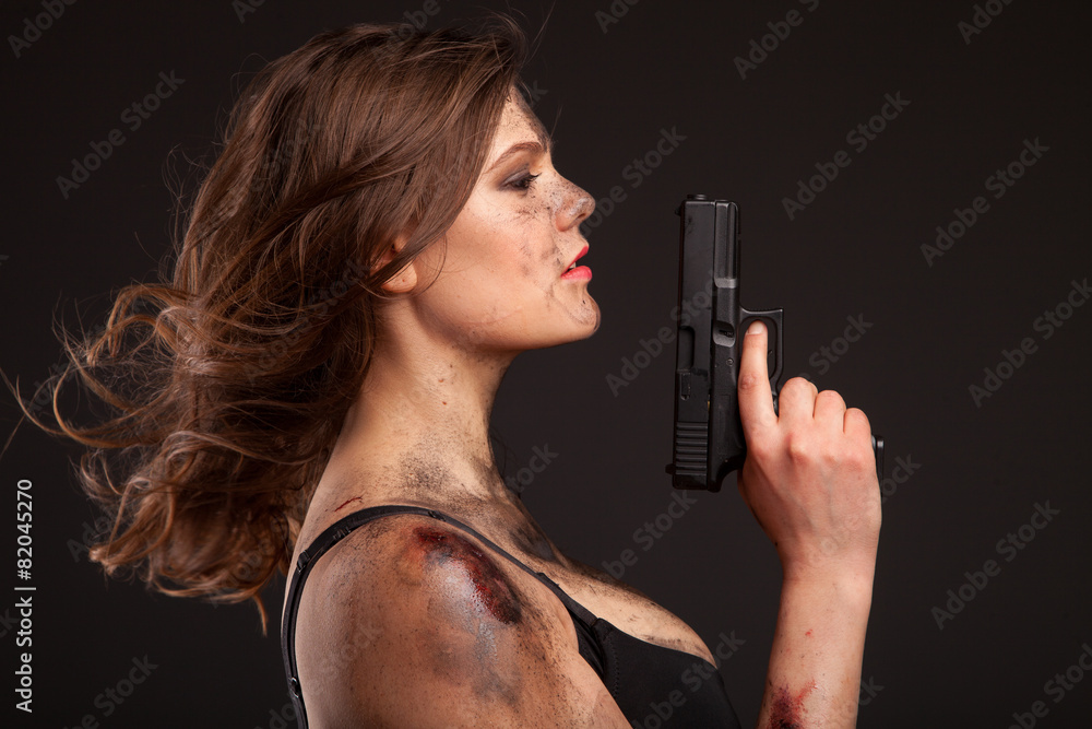 Beautiful, hot and sexy woman with gun. Riot girl. Beautiful, hot and sexy woman with gun. Riot girl.