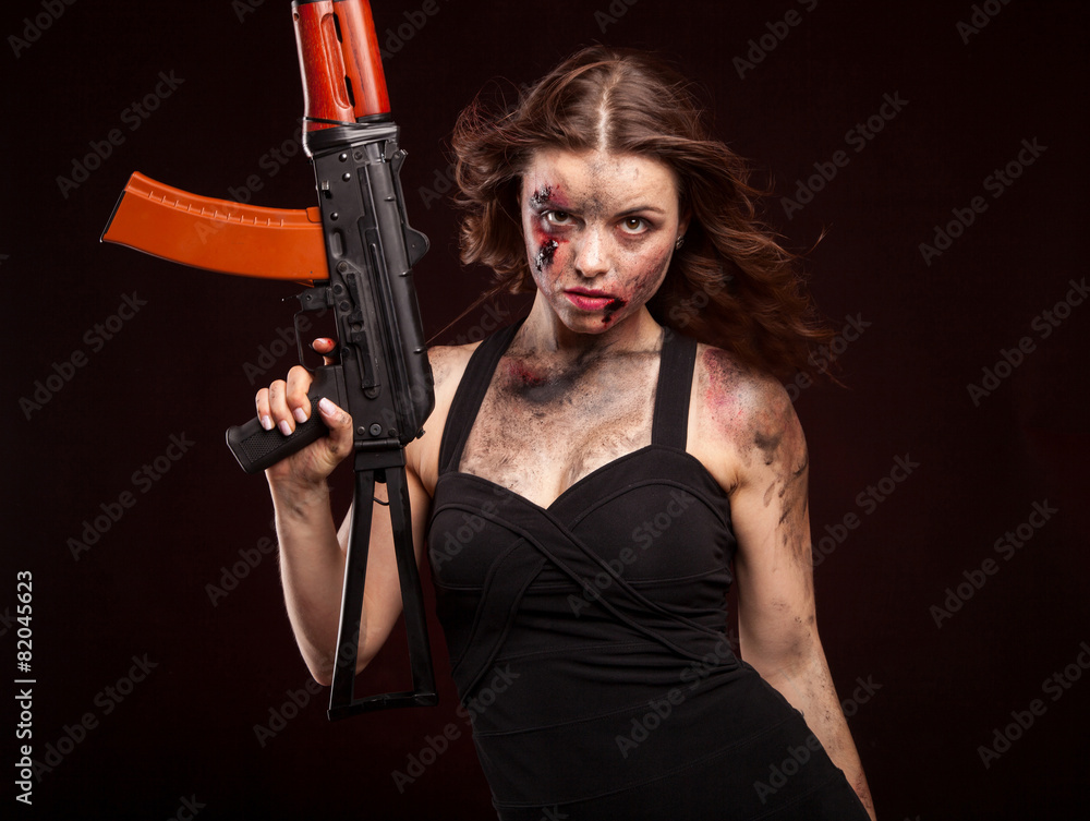 Sexy woman with weapon on dark background. Riot girl. Sexy woman with weapon on dark background. Riot girl.