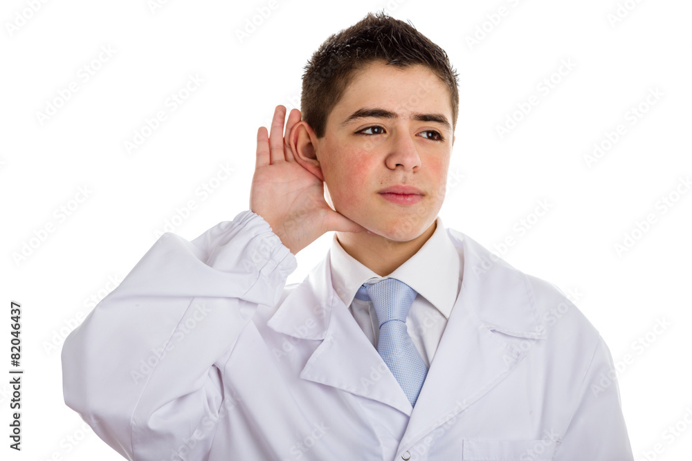 Hearing gesture by boy doctor while holding his ear Hearing gesture by boy doctor while holding his ear