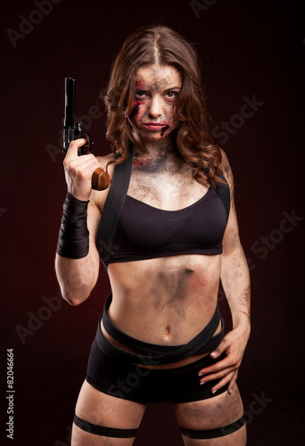 Wallpaper Mural Woman warrior posing with knife. Ready to fight. With dirty face Torontodigital.ca