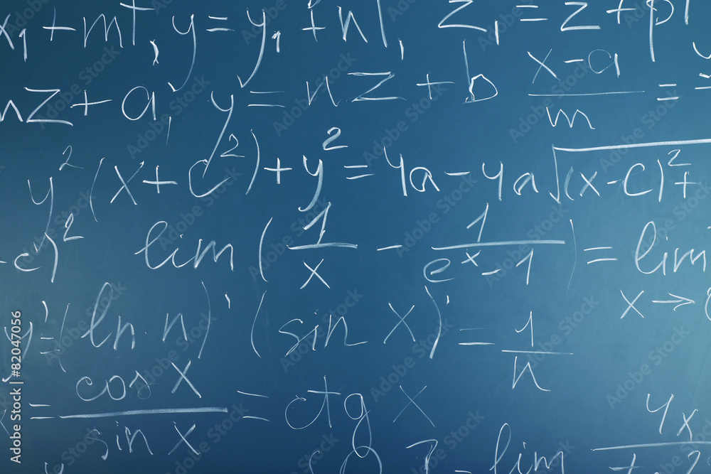 Maths formulas on chalkboard background