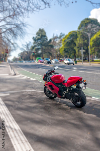 Sport motorcycle stands on the sidewalk in Melbourne, Australia.