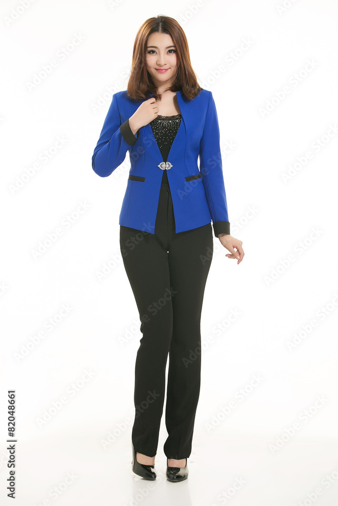 Young Asian women wearing a suit in front of a white background Young Asian women wearing a suit in front of a white background