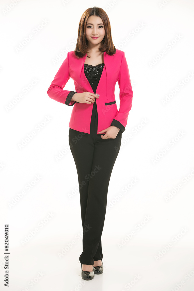 Young Asian women wearing a suit in front of a white background Young Asian women wearing a suit in front of a white background