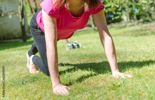 Woman doing physical exercises