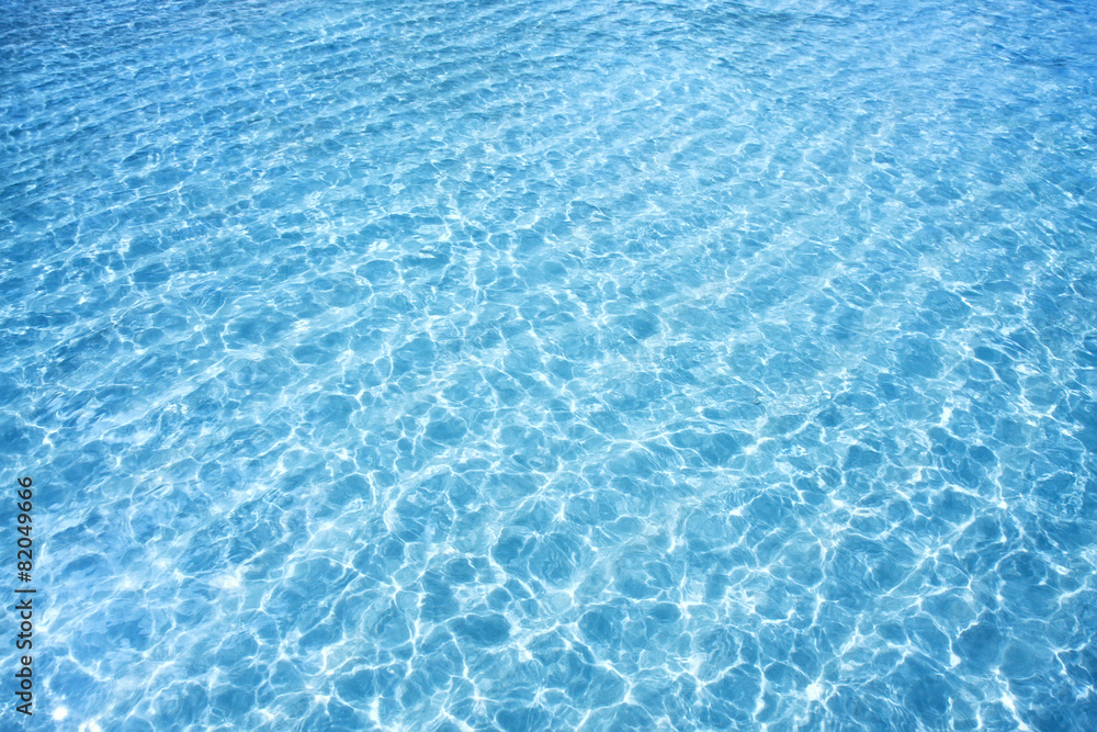 Shining blue water ripple background