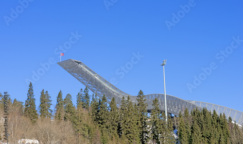 Photography Holmenkollen ski jump in Oslo at sunny winter day