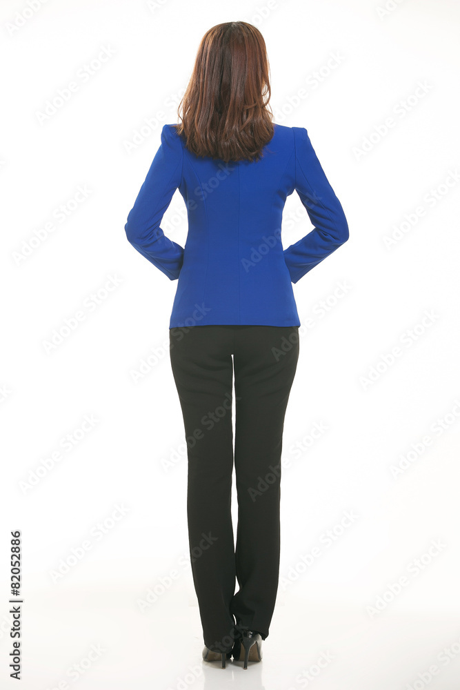 Fototapeta premium Young Asian women wearing a suit in front of a white background
