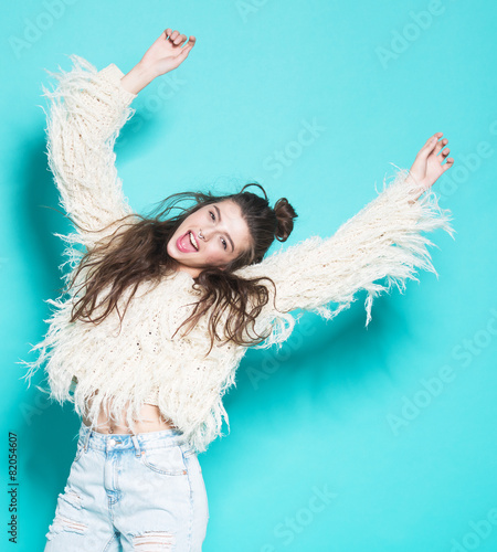 portrait of cheerful fashion hipster girl going crazy making