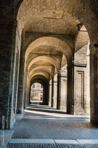Archway, Columns, Courtyard and Cobblestones in Palace of Pilott
