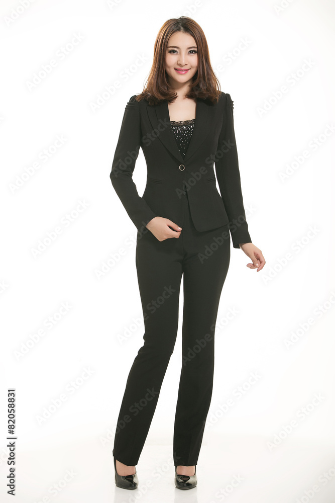 Young Asian women wearing a suit in front of a white background Young Asian women wearing a suit in front of a white background