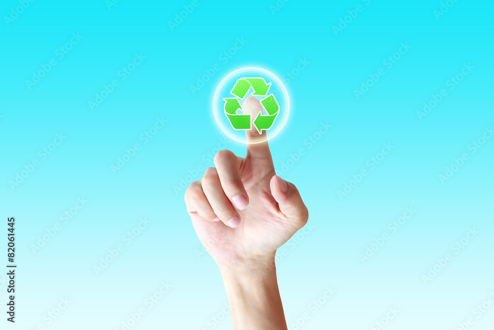 hand pushing a button recycle on a touch screen interface hand pushing a button recycle on a touch screen interface