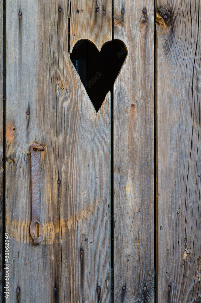 wooden restroom door wih heart shape wooden restroom door wih heart shape
