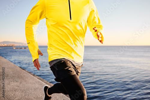 Photography Running man - male runner training outdoors athlete on beautiful