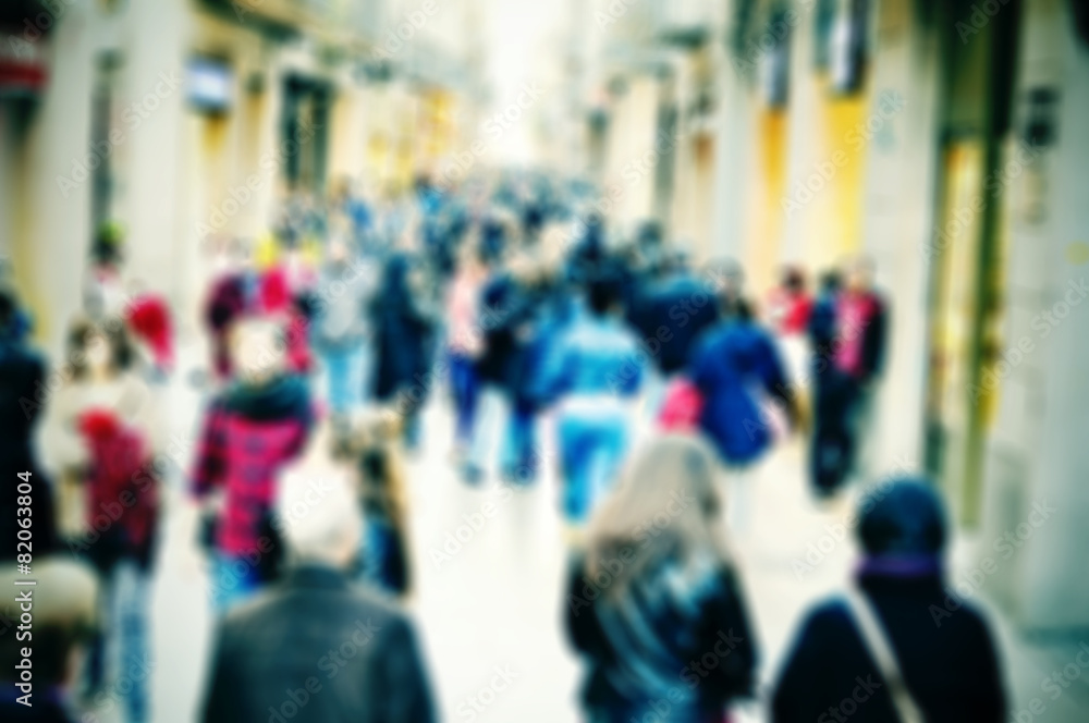 defocused blur background of people walking
