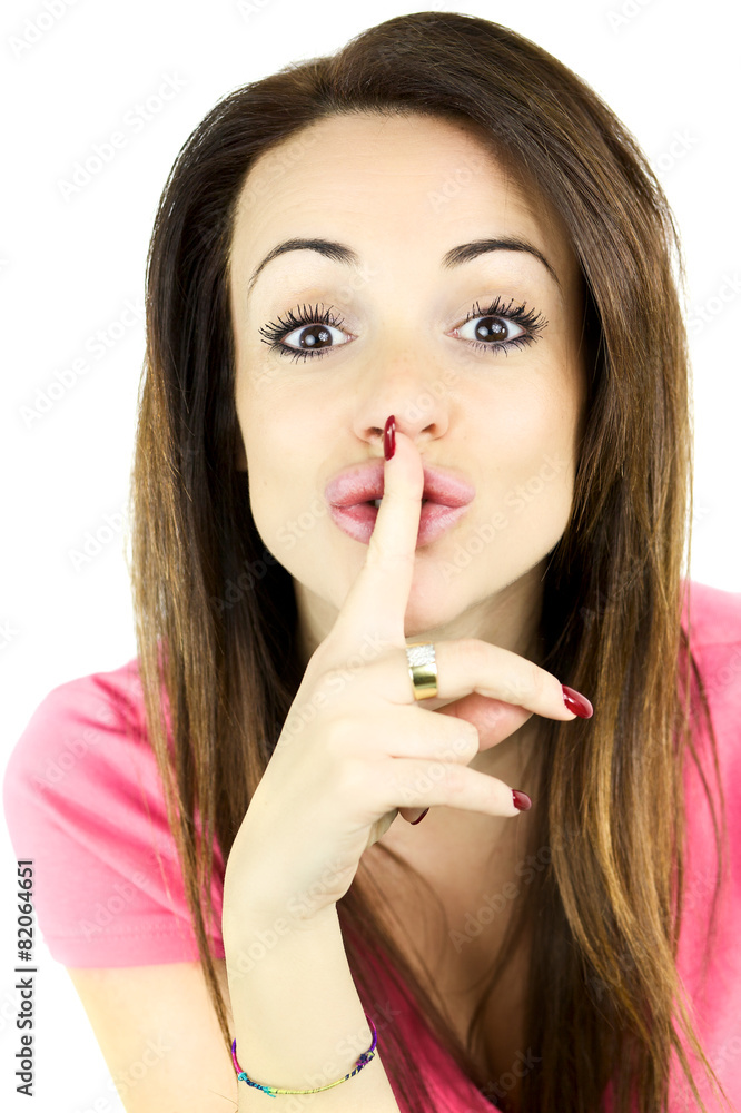 Happy woman making silence sign funny Happy woman making silence sign funny