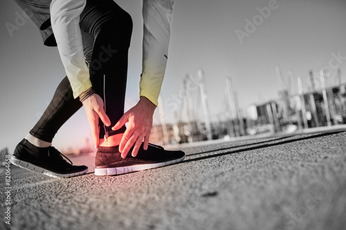 Broken twisted ankle - running sport injury. Athletic man runner