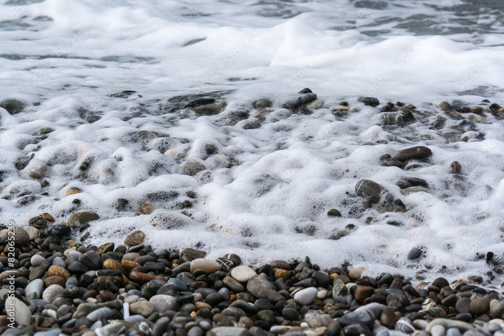 Sea waves on a pebbly shore