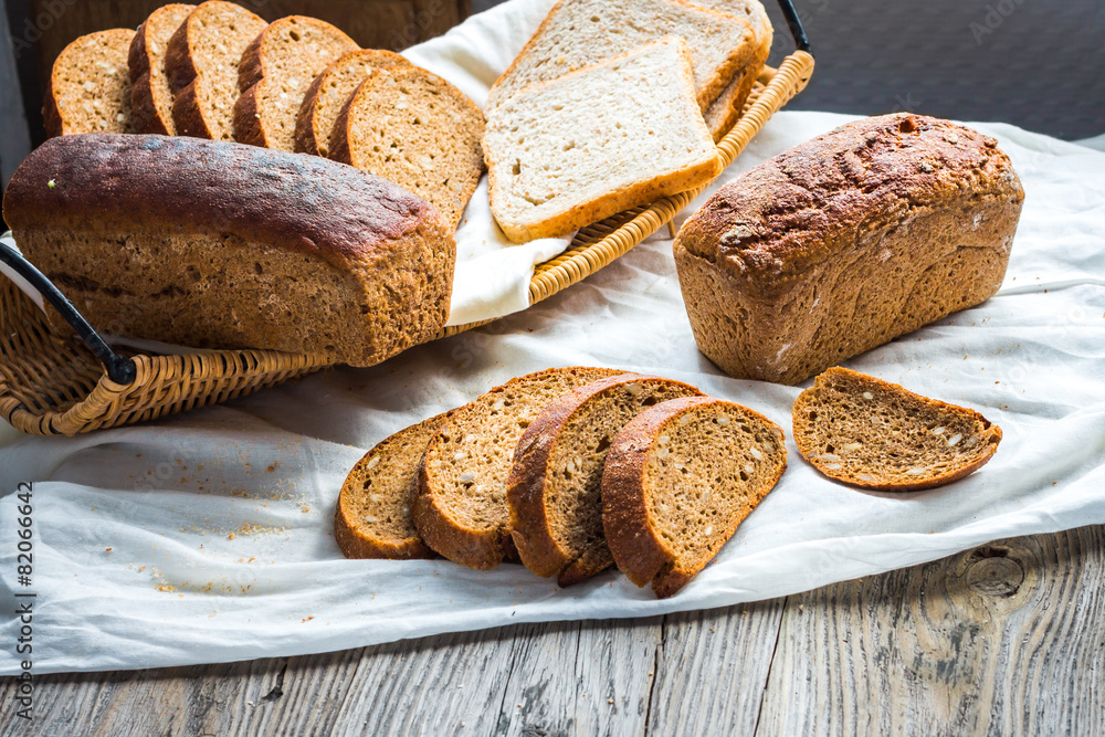 assortment of baked bread, slices of rye bread, bran cereal, rus