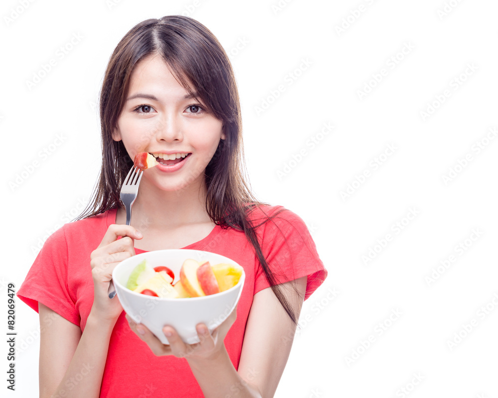 Chinese woman holding bowl of fruit Chinese woman holding bowl of fruit