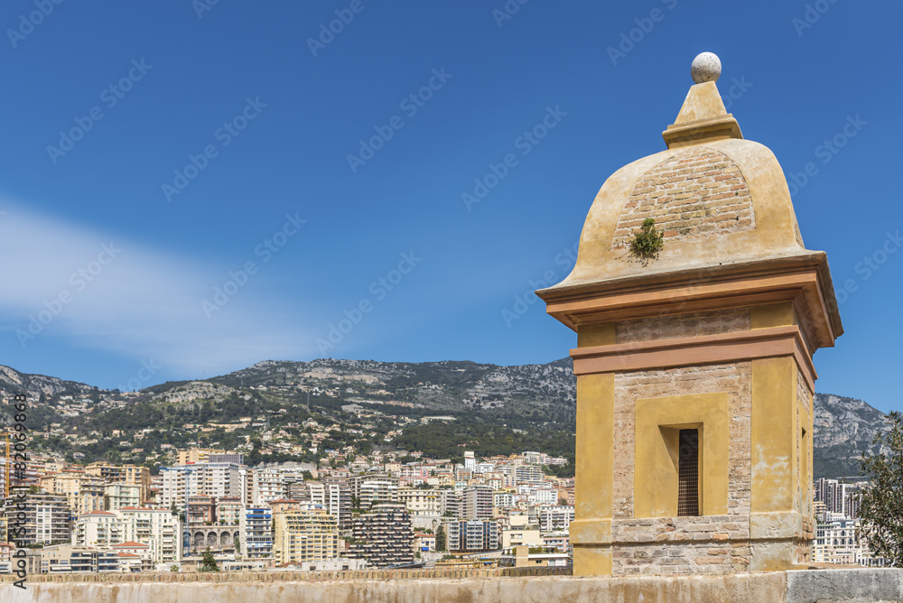 Obraz premium Monaco with a tower and the wall of the old city in the foregrou