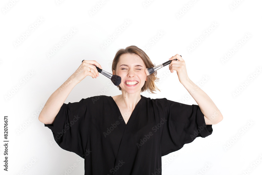 Obraz premium Happy woman makeup artist with brush isolated