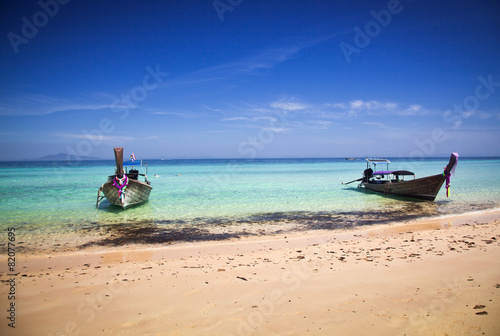 Longtail boats on the beautiful beach, Thailand © Melinda Nagy