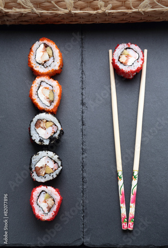 sushi with chopsticks