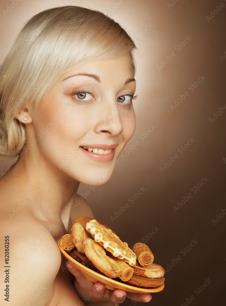 young attractive woman with cookies young attractive woman with cookies