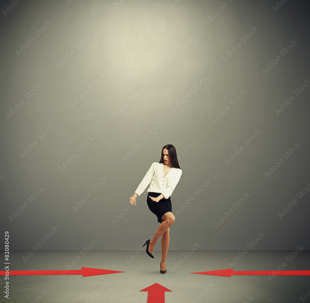 woman in formal wear over dark woman in formal wear over dark