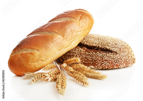 Fresh bread with wheat isolated on white
