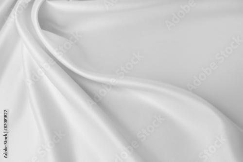 Lines of silky white fabric texture background. Copy space