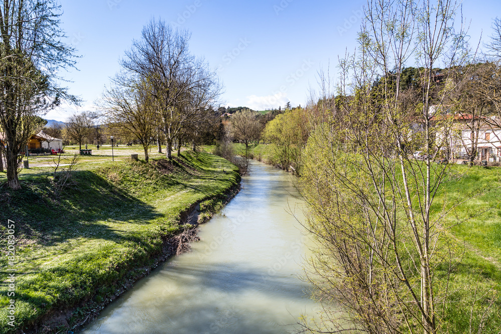 The tranquility of a quiet river in the countryside of the hills