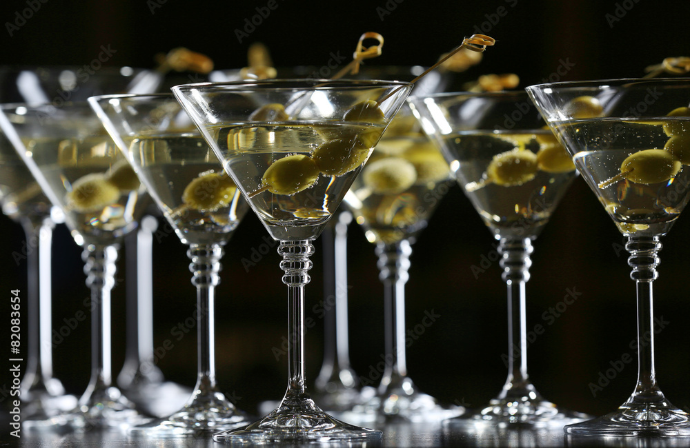 Glasses of cocktails on bar background Glasses of cocktails on bar background