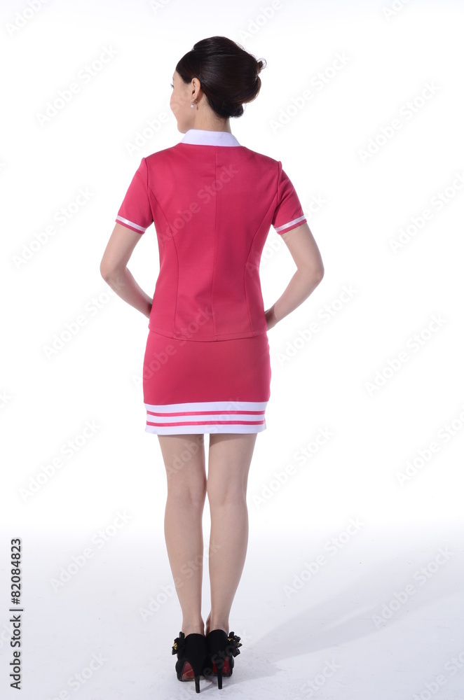 Active girl wear professional attire in front of a white backgro Active girl wear professional attire in front of a white backgro