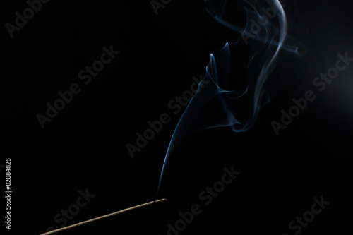 Joss stick and smoke.