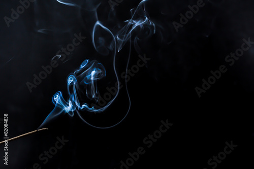 Joss stick and smoke.