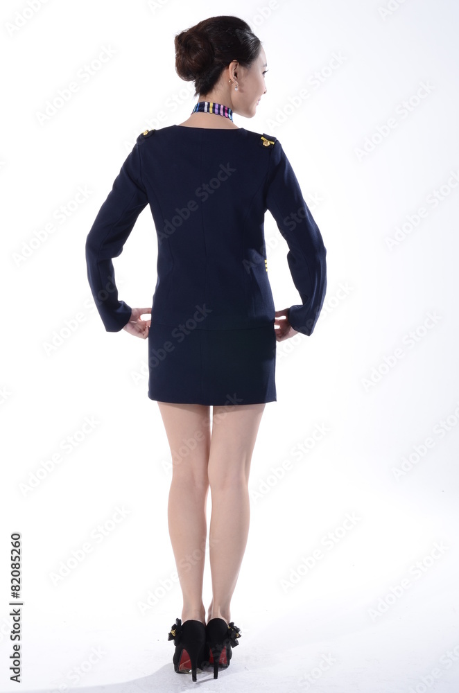 Active girl wear professional attire in front of a white backgro Active girl wear professional attire in front of a white backgro