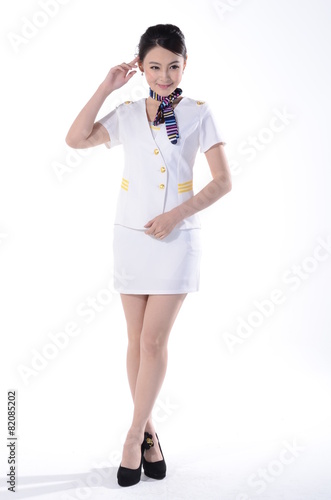 Active girl wear professional attire in front of a white backgro