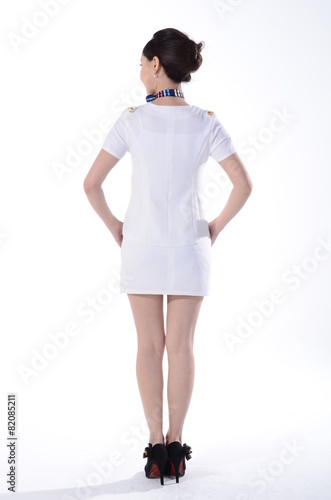 Active girl wear professional attire in front of a white backgro