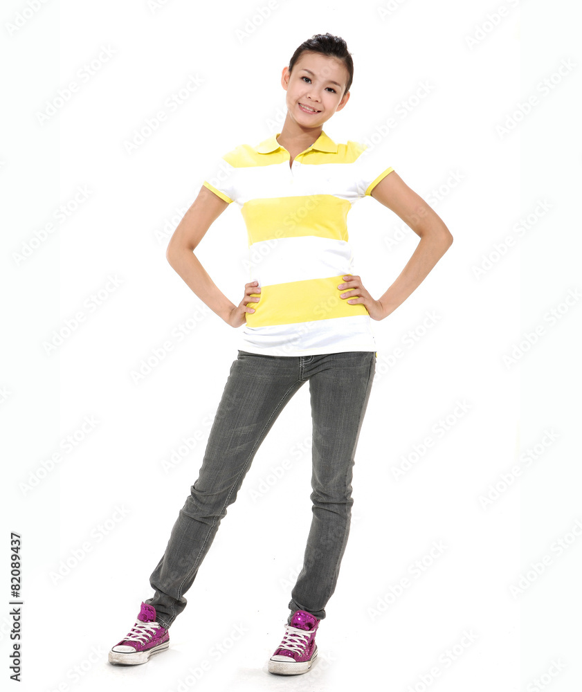 Full length image of a casual girl smiling isolated posing Full length image of a casual girl smiling isolated posing
