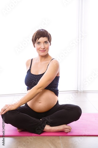 Pregnant woman keeping in shape