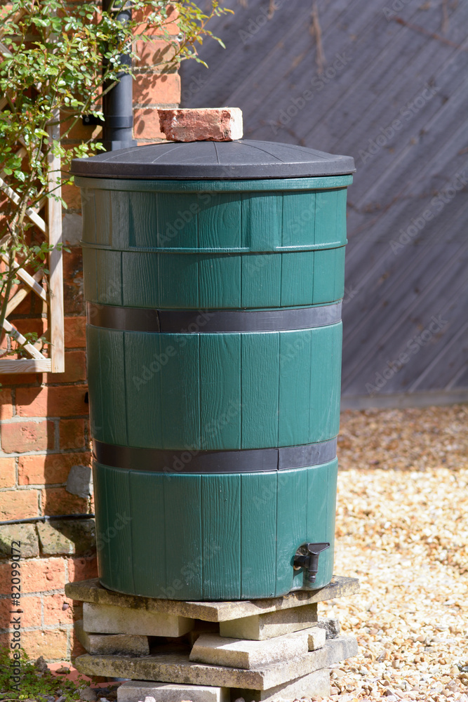 Obraz premium Large green plastic water butt