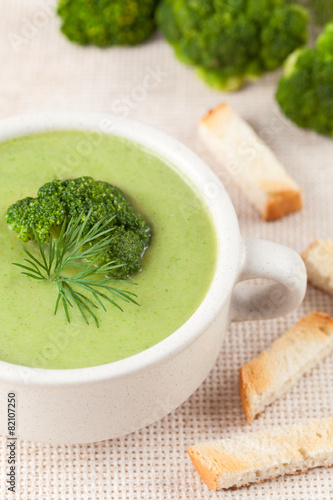 Appetizing broccoli soup super food recipe in a white bowl
