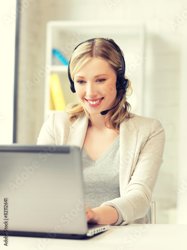 helpline operator with laptop computer