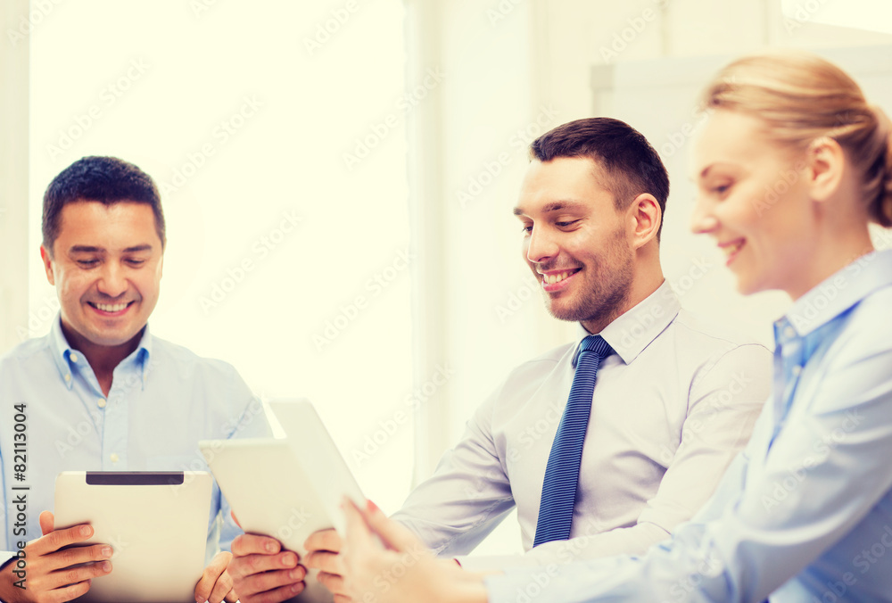 business team working with tablet pc in office business team working with tablet pc in office