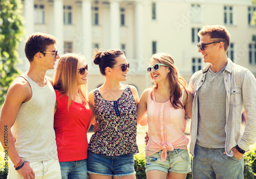 group of smiling friends outdoors